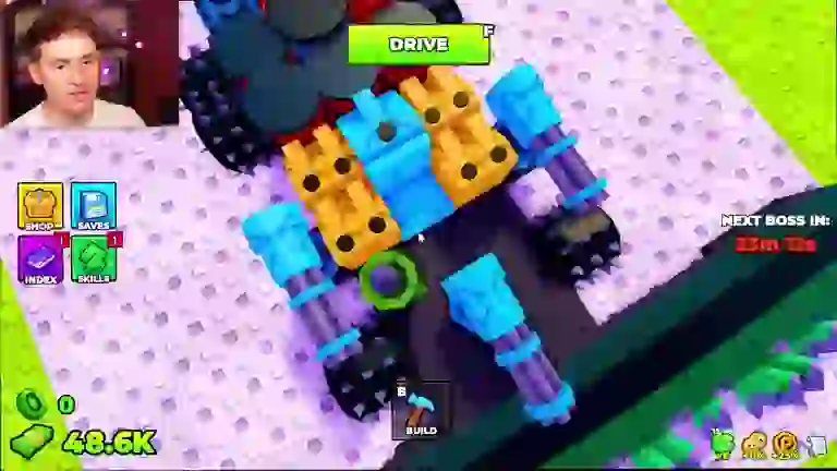 A heavily armed Build and Kill Zombies vehicle with multiple blue turrets mounted on tank tracks